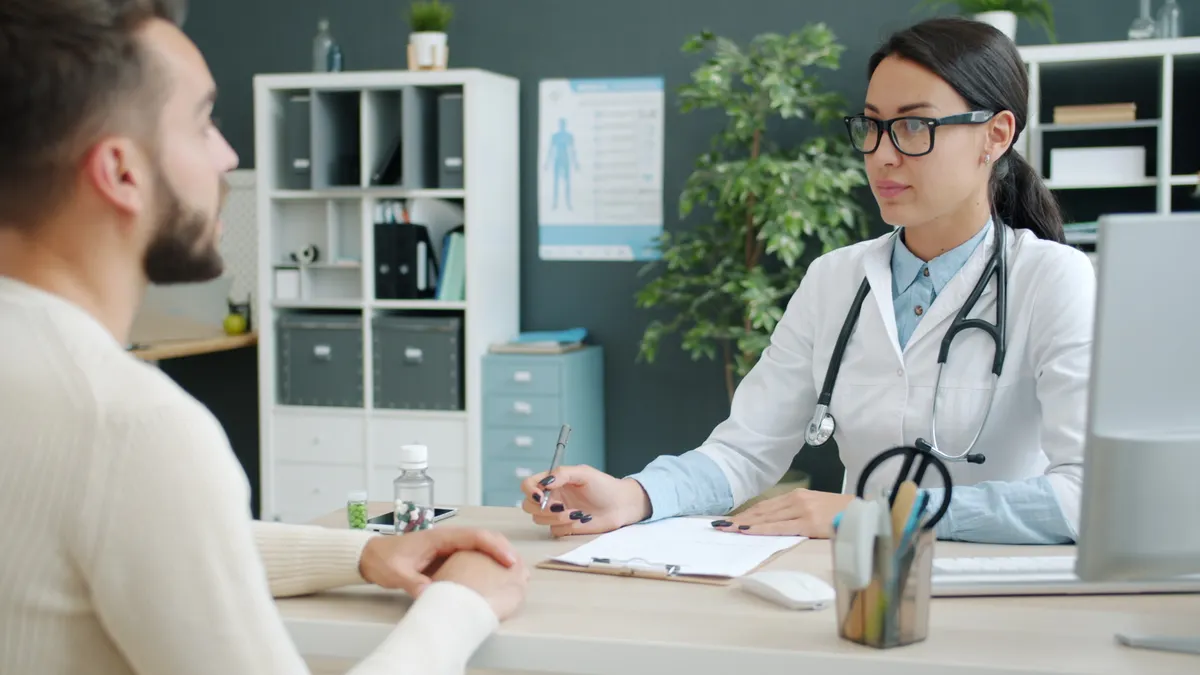 female doctor in consultation with patient
